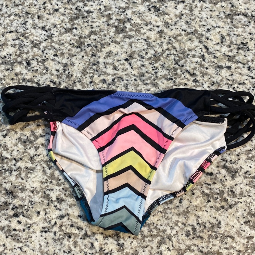 Pink swimsuit. BOTTOMS only. Size small.